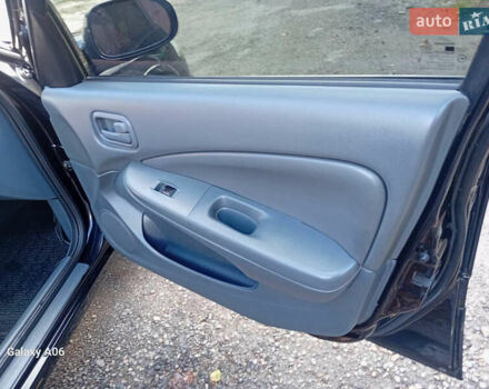 Черный Ниссан Альмера, объемом двигателя 1.6 л и пробегом 185 тыс. км за 4500 $, фото 53 на Automoto.ua