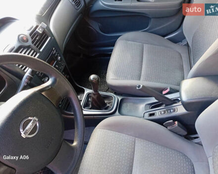 Черный Ниссан Альмера, объемом двигателя 1.6 л и пробегом 185 тыс. км за 4500 $, фото 79 на Automoto.ua