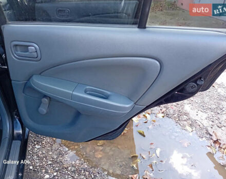 Черный Ниссан Альмера, объемом двигателя 1.6 л и пробегом 185 тыс. км за 4500 $, фото 50 на Automoto.ua