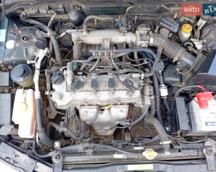 Черный Ниссан Альмера, объемом двигателя 1.6 л и пробегом 185 тыс. км за 4500 $, фото 88 на Automoto.ua