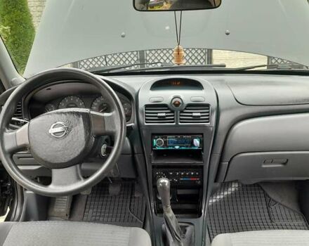 Черный Ниссан Альмера, объемом двигателя 1.6 л и пробегом 180 тыс. км за 4000 $, фото 10 на Automoto.ua