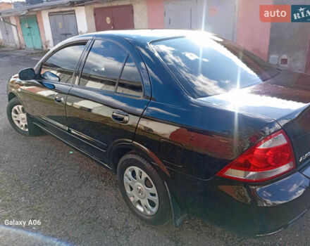 Черный Ниссан Альмера, объемом двигателя 1.6 л и пробегом 185 тыс. км за 4500 $, фото 25 на Automoto.ua