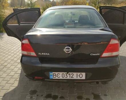 Черный Ниссан Альмера, объемом двигателя 1.6 л и пробегом 230 тыс. км за 5000 $, фото 2 на Automoto.ua
