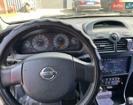 Черный Ниссан Альмера, объемом двигателя 1.6 л и пробегом 241 тыс. км за 3500 $, фото 5 на Automoto.ua