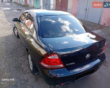 Черный Ниссан Альмера, объемом двигателя 1.6 л и пробегом 185 тыс. км за 4500 $, фото 22 на Automoto.ua