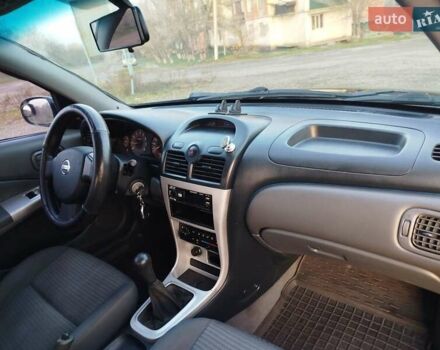 Черный Ниссан Альмера, объемом двигателя 1.6 л и пробегом 244 тыс. км за 4500 $, фото 30 на Automoto.ua