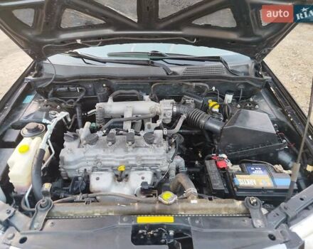 Черный Ниссан Альмера, объемом двигателя 1.6 л и пробегом 244 тыс. км за 4500 $, фото 41 на Automoto.ua