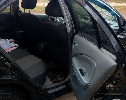 Черный Ниссан Альмера, объемом двигателя 1.6 л и пробегом 262 тыс. км за 5400 $, фото 7 на Automoto.ua