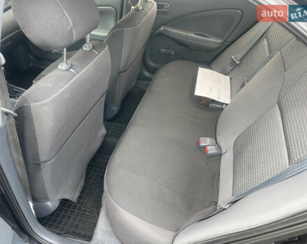 Черный Ниссан Альмера, объемом двигателя 1.6 л и пробегом 206 тыс. км за 4600 $, фото 5 на Automoto.ua