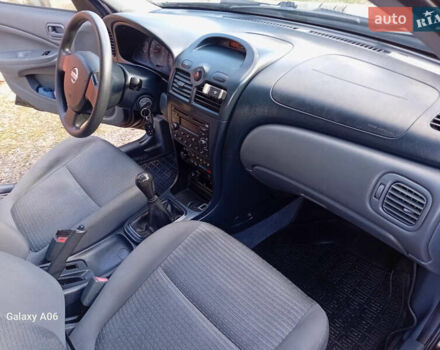 Черный Ниссан Альмера, объемом двигателя 1.6 л и пробегом 185 тыс. км за 4500 $, фото 70 на Automoto.ua