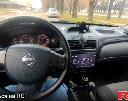 Черный Ниссан Альмера, объемом двигателя 1.6 л и пробегом 262 тыс. км за 5400 $, фото 5 на Automoto.ua