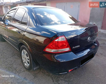 Черный Ниссан Альмера, объемом двигателя 1.6 л и пробегом 185 тыс. км за 4500 $, фото 19 на Automoto.ua