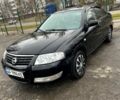 Черный Ниссан Альмера, объемом двигателя 1.6 л и пробегом 221 тыс. км за 4999 $, фото 1 на Automoto.ua