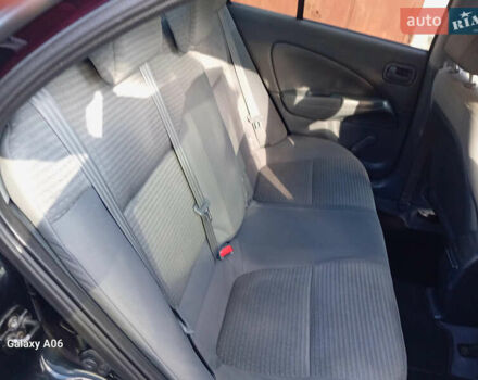 Черный Ниссан Альмера, объемом двигателя 1.6 л и пробегом 185 тыс. км за 4500 $, фото 62 на Automoto.ua