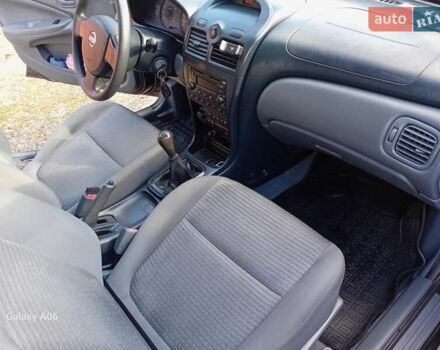 Черный Ниссан Альмера, объемом двигателя 1.6 л и пробегом 185 тыс. км за 4500 $, фото 55 на Automoto.ua