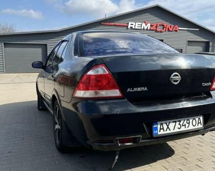 Черный Ниссан Альмера, объемом двигателя 1.6 л и пробегом 241 тыс. км за 3500 $, фото 7 на Automoto.ua