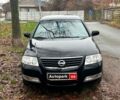 Черный Ниссан Альмера, объемом двигателя 1.6 л и пробегом 203 тыс. км за 5990 $, фото 1 на Automoto.ua