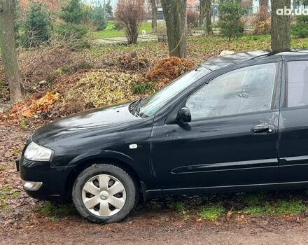 Черный Ниссан Альмера, объемом двигателя 1.6 л и пробегом 203 тыс. км за 5990 $, фото 5 на Automoto.ua
