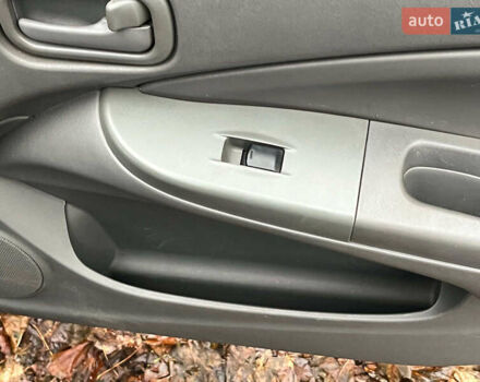 Чорний Ніссан Альмера, об'ємом двигуна 1.6 л та пробігом 203 тис. км за 5990 $, фото 16 на Automoto.ua