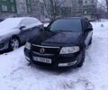 Черный Ниссан Альмера, объемом двигателя 1.6 л и пробегом 240 тыс. км за 4000 $, фото 1 на Automoto.ua