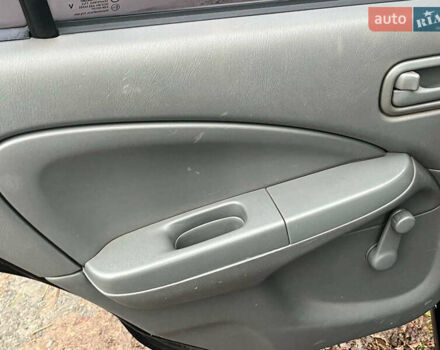 Чорний Ніссан Альмера, об'ємом двигуна 1.6 л та пробігом 203 тис. км за 5990 $, фото 26 на Automoto.ua