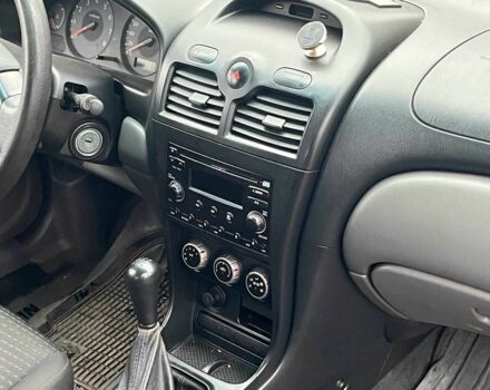 Черный Ниссан Альмера, объемом двигателя 1.6 л и пробегом 203 тыс. км за 5990 $, фото 19 на Automoto.ua