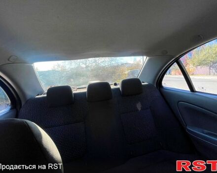 Черный Ниссан Альмера, объемом двигателя 1.6 л и пробегом 300 тыс. км за 4250 $, фото 6 на Automoto.ua