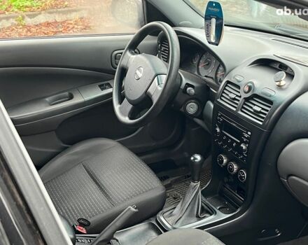 Черный Ниссан Альмера, объемом двигателя 1.6 л и пробегом 203 тыс. км за 5990 $, фото 18 на Automoto.ua