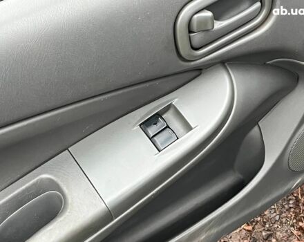 Черный Ниссан Альмера, объемом двигателя 1.6 л и пробегом 203 тыс. км за 5990 $, фото 28 на Automoto.ua