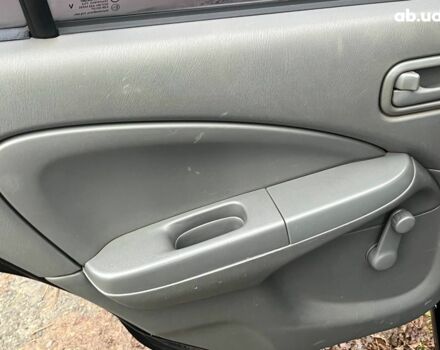 Черный Ниссан Альмера, объемом двигателя 1.6 л и пробегом 203 тыс. км за 5990 $, фото 26 на Automoto.ua