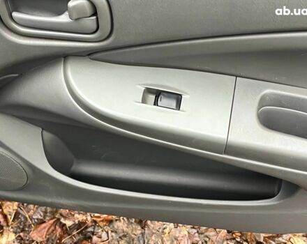 Черный Ниссан Альмера, объемом двигателя 1.6 л и пробегом 203 тыс. км за 5990 $, фото 16 на Automoto.ua