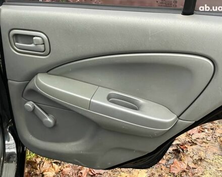 Черный Ниссан Альмера, объемом двигателя 1.6 л и пробегом 203 тыс. км за 5990 $, фото 24 на Automoto.ua