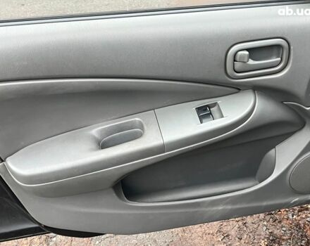 Черный Ниссан Альмера, объемом двигателя 1.6 л и пробегом 203 тыс. км за 5990 $, фото 27 на Automoto.ua