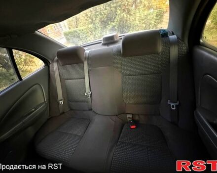 Черный Ниссан Альмера, объемом двигателя 1.6 л и пробегом 212 тыс. км за 5300 $, фото 5 на Automoto.ua