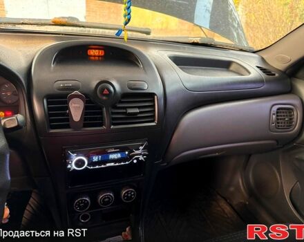 Черный Ниссан Альмера, объемом двигателя 1.6 л и пробегом 212 тыс. км за 5300 $, фото 6 на Automoto.ua