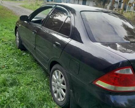 Чорний Ніссан Альмера, об'ємом двигуна 1.6 л та пробігом 241 тис. км за 4150 $, фото 6 на Automoto.ua