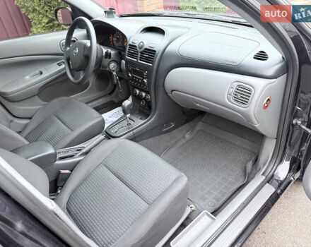 Черный Ниссан Альмера, объемом двигателя 1.6 л и пробегом 123 тыс. км за 6499 $, фото 15 на Automoto.ua