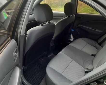 Чорний Ніссан Альмера, об'ємом двигуна 1.6 л та пробігом 241 тис. км за 4150 $, фото 5 на Automoto.ua