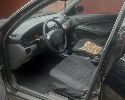Чорний Ніссан Альмера, об'ємом двигуна 1.6 л та пробігом 63 тис. км за 6700 $, фото 5 на Automoto.ua