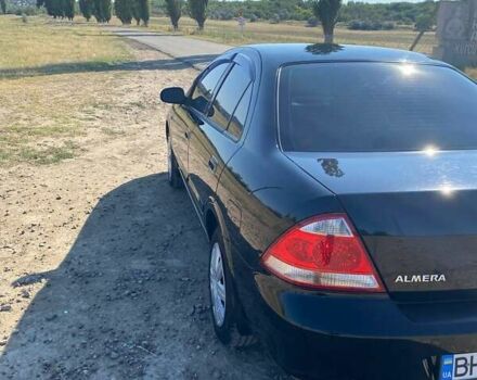 Черный Ниссан Альмера, объемом двигателя 1.6 л и пробегом 143 тыс. км за 6100 $, фото 4 на Automoto.ua