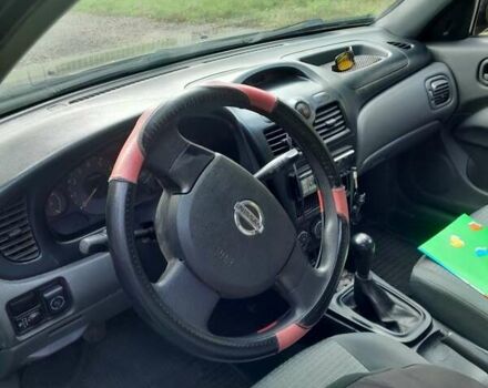 Чорний Ніссан Альмера, об'ємом двигуна 1.6 л та пробігом 241 тис. км за 4150 $, фото 3 на Automoto.ua