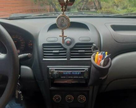 Чорний Ніссан Альмера, об'ємом двигуна 1.6 л та пробігом 63 тис. км за 6700 $, фото 14 на Automoto.ua