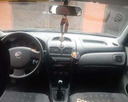 Чорний Ніссан Альмера, об'ємом двигуна 1.6 л та пробігом 63 тис. км за 6700 $, фото 12 на Automoto.ua