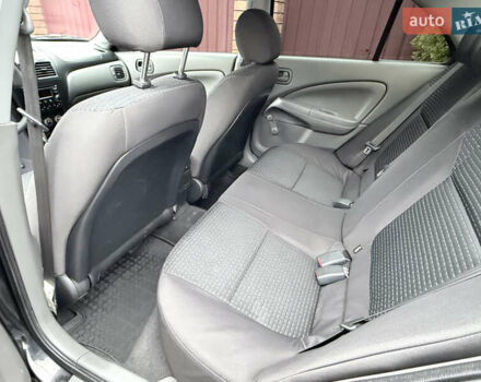 Черный Ниссан Альмера, объемом двигателя 1.6 л и пробегом 123 тыс. км за 6499 $, фото 14 на Automoto.ua