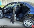 Черный Ниссан Альмера, объемом двигателя 1.6 л и пробегом 133 тыс. км за 6500 $, фото 5 на Automoto.ua