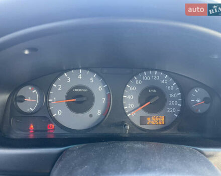 Черный Ниссан Альмера, объемом двигателя 1.6 л и пробегом 242 тыс. км за 5000 $, фото 13 на Automoto.ua