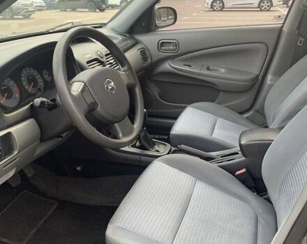 Черный Ниссан Альмера, объемом двигателя 1.6 л и пробегом 129 тыс. км за 6500 $, фото 12 на Automoto.ua