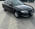 Черный Ниссан Альмера, объемом двигателя 1.6 л и пробегом 232 тыс. км за 5800 $, фото 1 на Automoto.ua