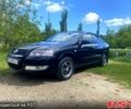 Черный Ниссан Альмера, объемом двигателя 1.6 л и пробегом 157 тыс. км за 5600 $, фото 1 на Automoto.ua
