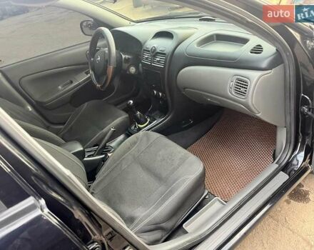 Чорний Ніссан Альмера, об'ємом двигуна 1.6 л та пробігом 140 тис. км за 5900 $, фото 6 на Automoto.ua